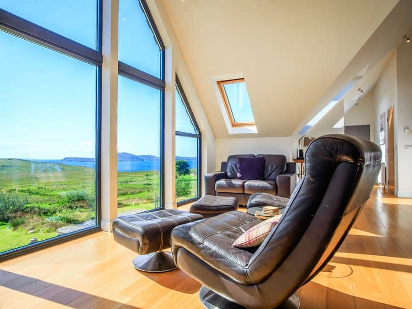 Amazing seascape view from the floor to ceiling windows in the living room | Stac Polly Lodge, Achiltibuie near Ullapool