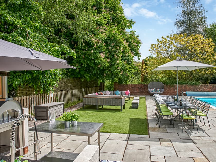 Sitting-out-area | The West Wing at The Manor House - White Birch Manor Getaways, Awre, near Westbury-on-Severn
