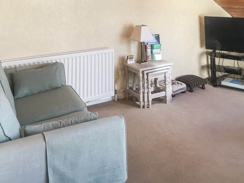 Appealing living room with balcony access | Harbour Cottage, Haverigg, near Millom