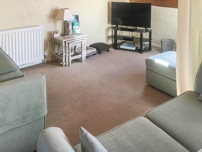 Comfy seating within living room | Harbour Cottage, Haverigg, near Millom