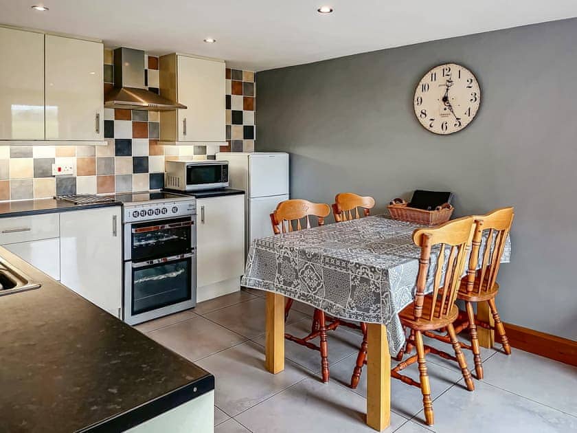 Convenient dining area within kitchen | Cotterill Barn - Cotterill Farm, Biggin by Hartington, near Buxton