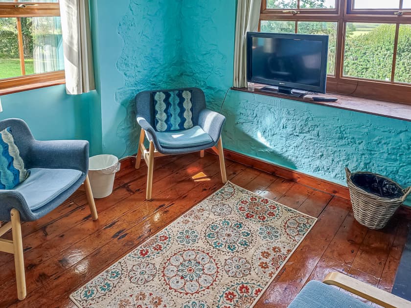 Ground floor bedroom lounge | Ceiliog Bach, Llangennith, near Swansea