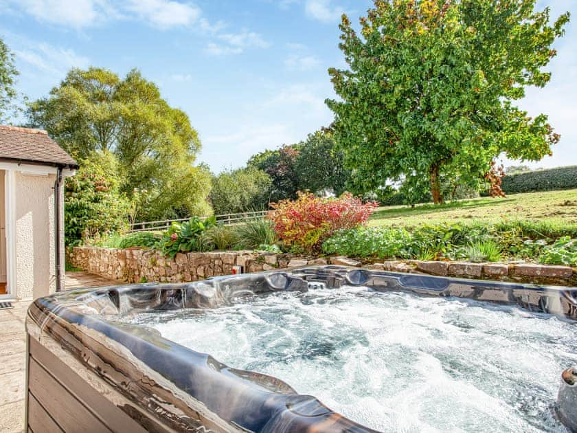 Hot tub | Fairways East - Cottages at The Mole Resort, Chittlehamholt, near Umberleigh