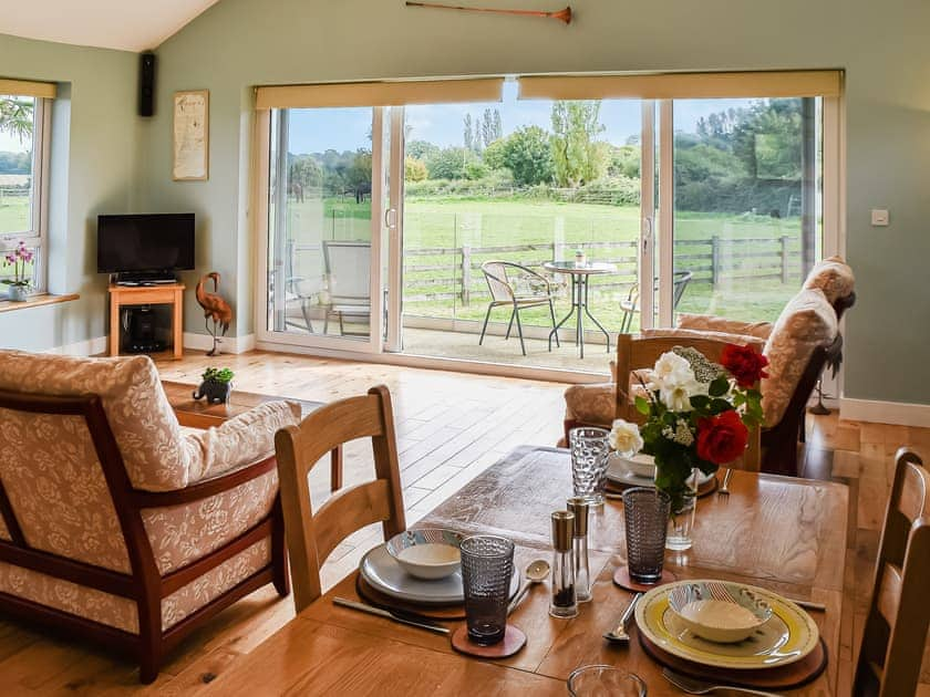 Living room/dining room | Cedar Lodge - Solar Rise Lodges, Old Buckenham