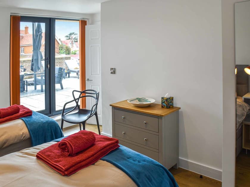 Twin bedroom with access to terrace  | South Terrace, Sheringham