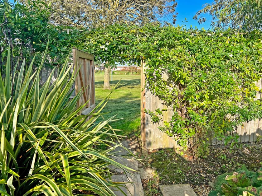 Access from rear garden to secure playing field | Meadow View, Weymouth