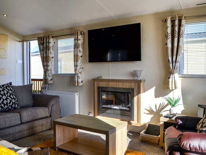 Living area | Morning Sunrise - Bonnie Escapes, Southerness