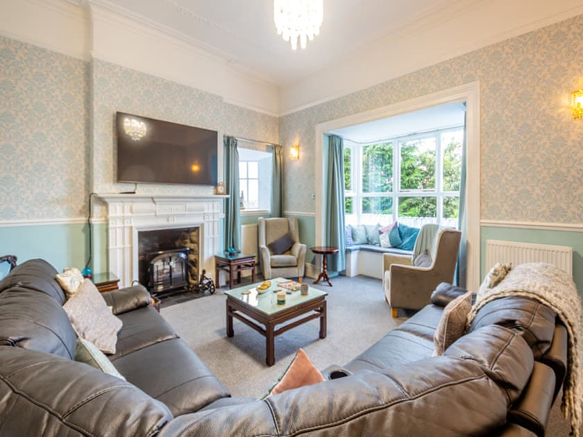 Feature fireplace within living room | Noddfa, Harlech