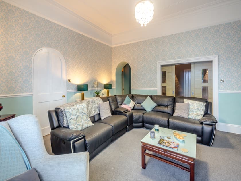 Comfy seating within living room | Noddfa, Harlech