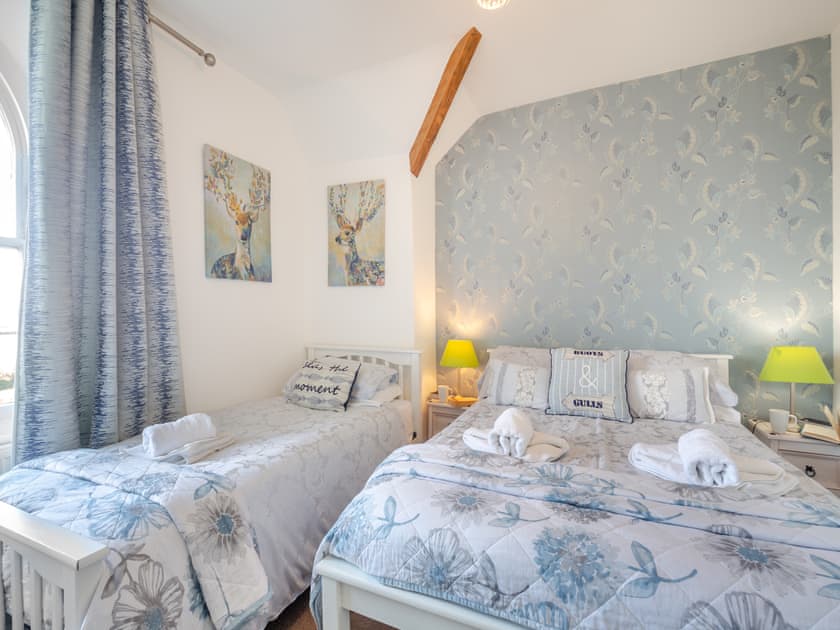 Family bedroom with a double and a single bed | Noddfa, Harlech