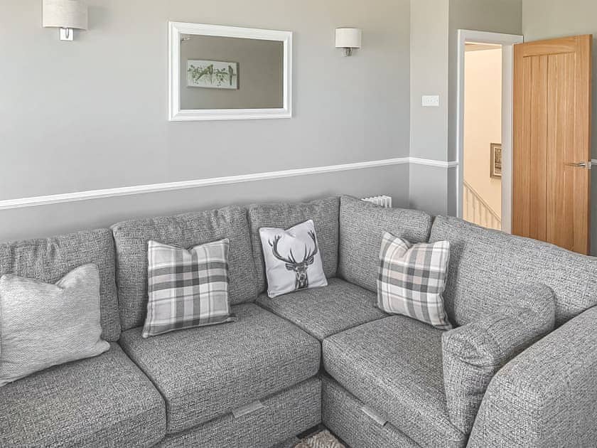 Living room/dining room | Sunrise Cottage - Bron Y Wendon Holiday Park, Llanddulas, near Llandudno