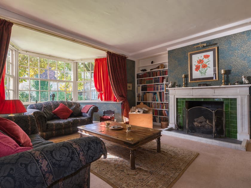 Comfortable living room with real log fire | The Sedgeford Hall - Sedgeford Hall Estate , Sedgeford, near Hunstanton