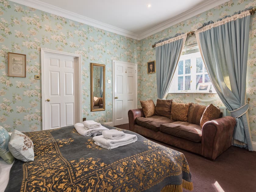 Double bedroom with sofa | The Sedgeford Hall - Sedgeford Hall Estate , Sedgeford, near Hunstanton