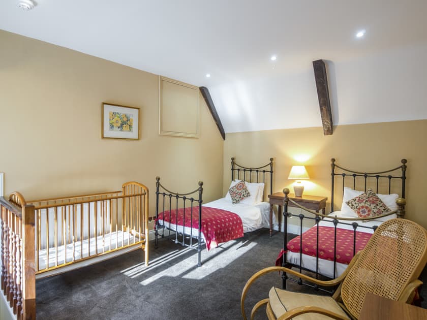 Airy twin bedroom with cot | The Sedgeford Hall - Sedgeford Hall Estate , Sedgeford, near Hunstanton