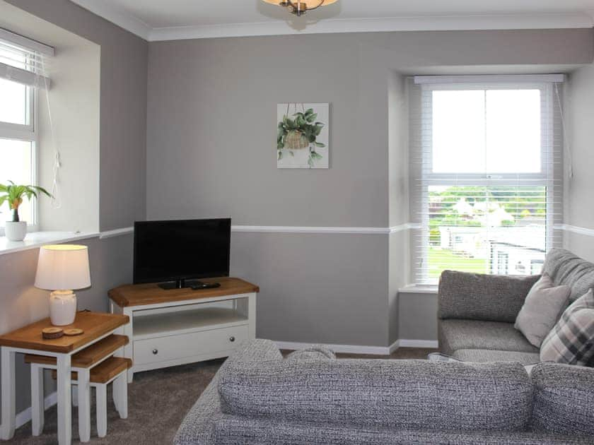 Living area | Sunrise Cottage - Bron Y Wendon Holiday Park, Llanddulas, near Llandudno