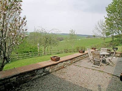Sitting-out-area | Riverbank Cottage - Hole House Farm Cottages, Pooley Bridge, nr. Ullswater