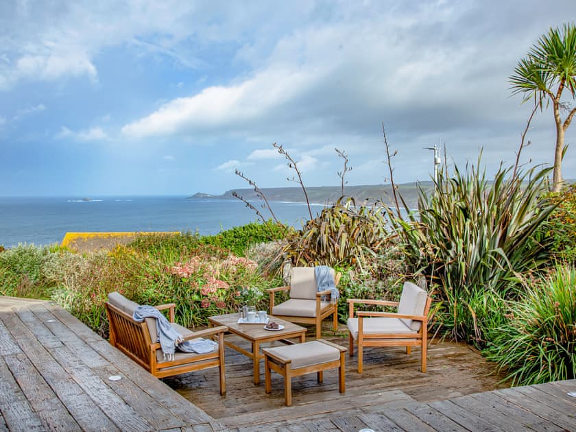 Great sitting out area - perfect for watching the sun go down | Shark Fin, Sennen