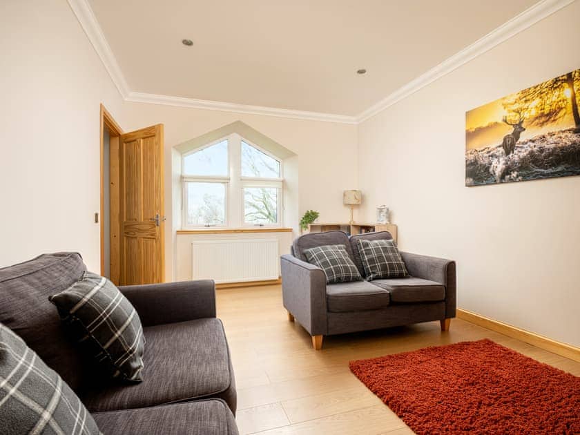 Attractive living room | Tornahatnach - Glenkindie Estate Holiday Cottages, Glenkindie, near Alford