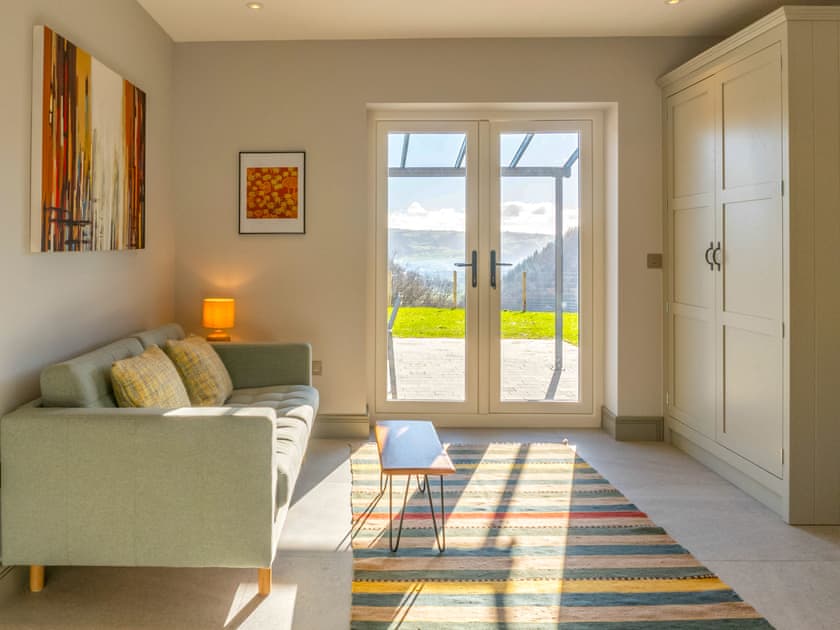 Casual living area | The Farmhouse at Gelli Newydd - Gelli Newydd Farm Cottages, Llanrwst