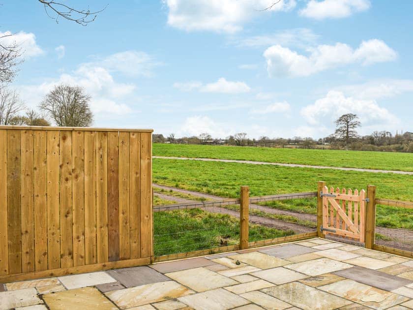 Patio | Langston Farm Chalet, Okeford Fitzpaine, near Blandford Forum