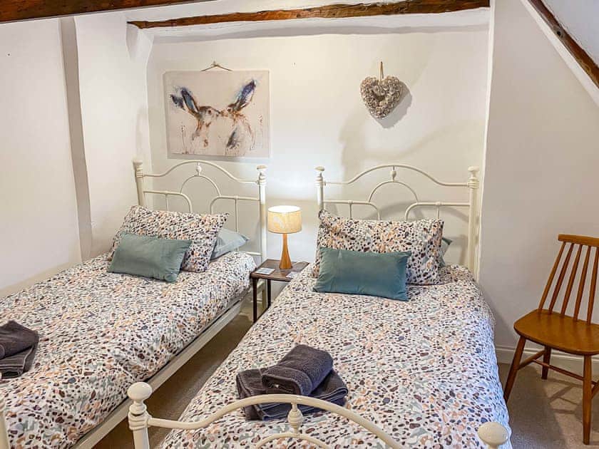 Quaint twin bedded room | Nell’s Cottage, Bridlington