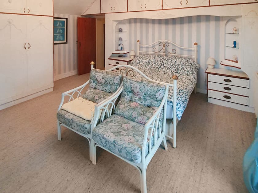 Comfortable double bedroom with built-in storage | Hen Ysgol, Llanfaethlu, Anglesey