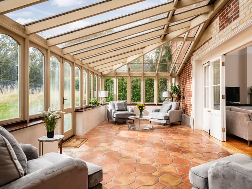 Large conservatory with dining area | Downwood Vineyard, Blandford