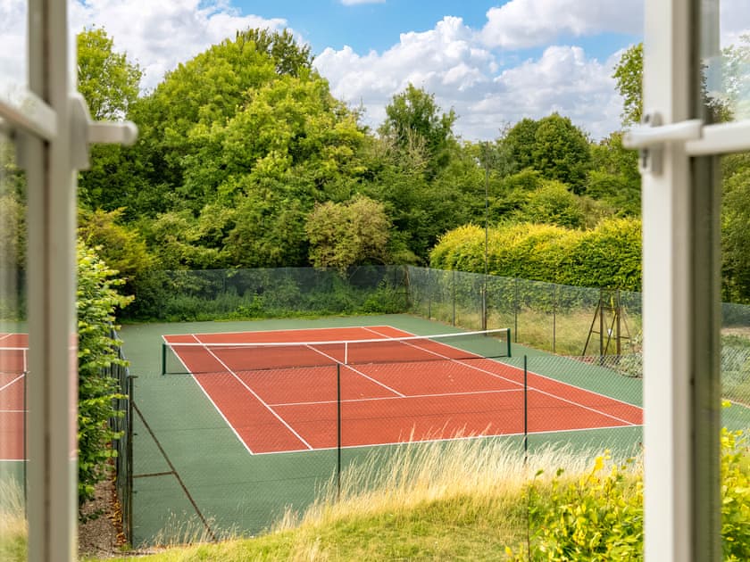 Enclosed tennis court | Downwood Vineyard, Blandford