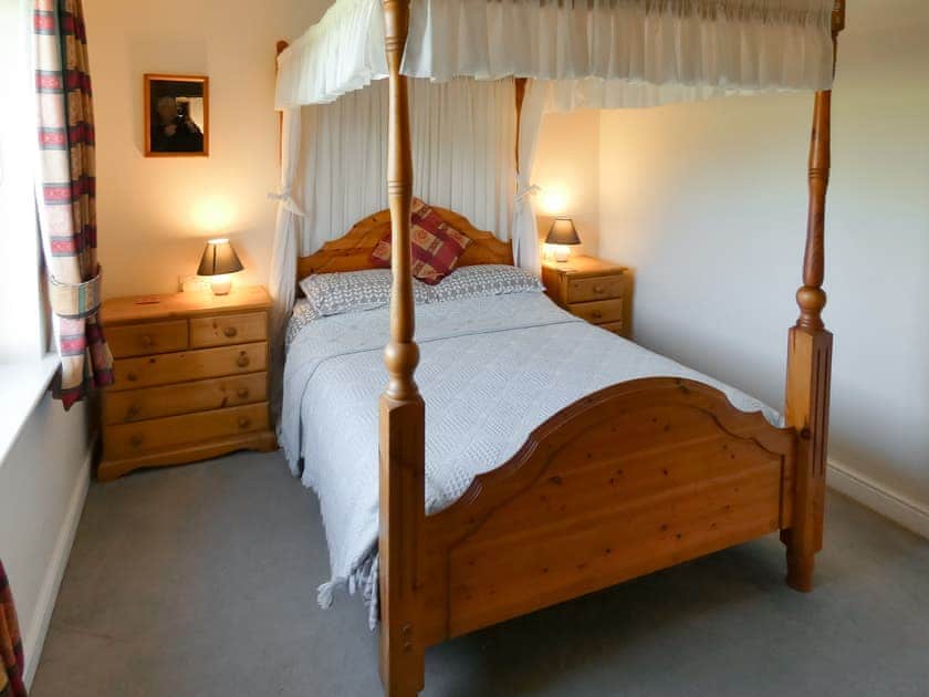 Four Poster bedroom | Bournstream Cottage, Bilbrook, near Minehead