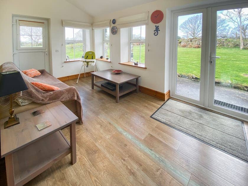 Living area/sun room  | Sgubor Wennol Ty Du, Llannor, near Pwllheli