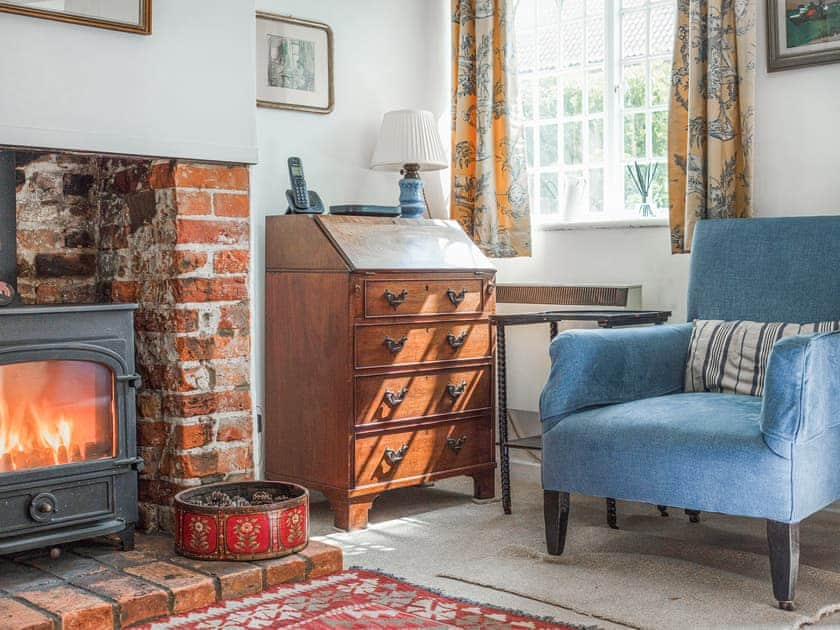 Cosy sitting room with woodburner  | Middle Cottage, Letheringsett, near Holt