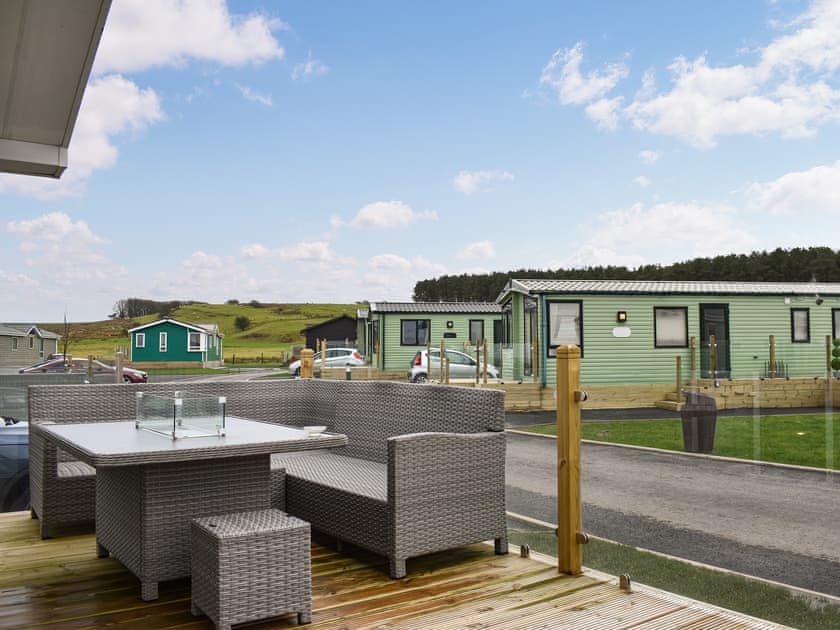 Outdoor eating area | Bears Lodge - Meadow Retreat Lodge Park, Moota, near Cockermouth