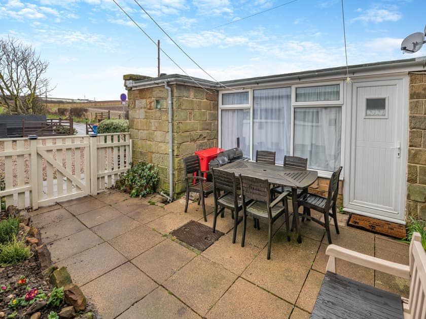 Sitting-out-area | Toll Bar Cottage, Sandsend, near Whitby