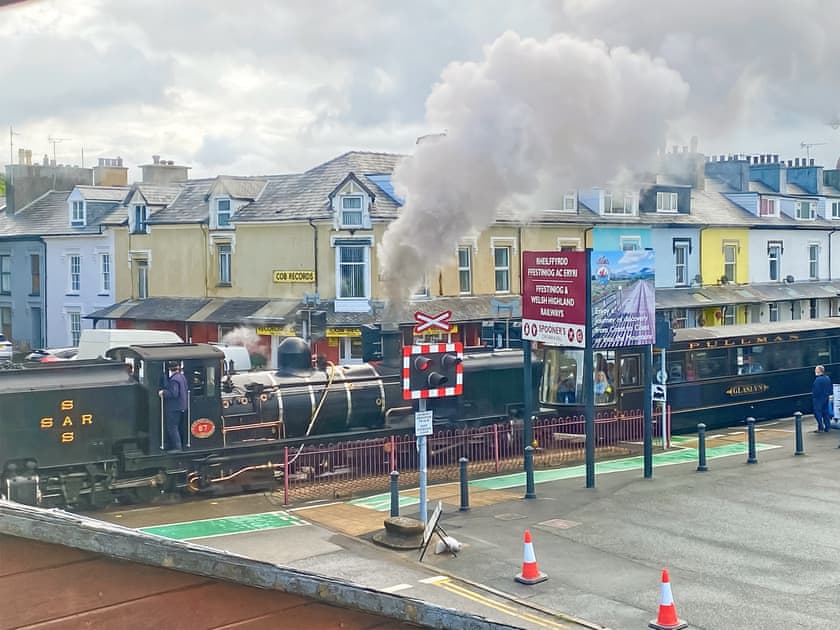 The view from bedroom 2 of the steam trains  | Rivers Edge Penthouse, Porthmadog