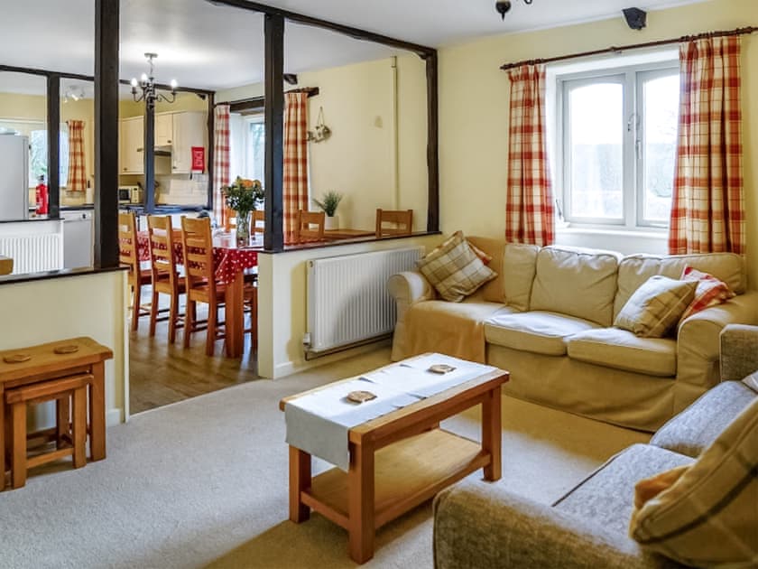 Comfy furniture in living room | The Tallet - Mennabroom Farm Cottages, Warleggan, near Bodmin