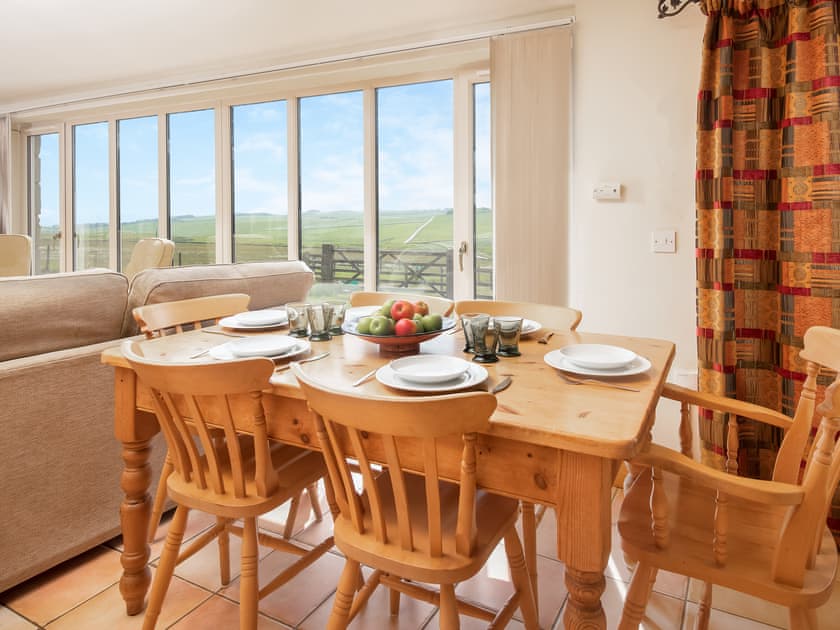 Living/ dining room with ceiling to floor windows | Grindon Cartshed, Grindon near Haydon Bridge