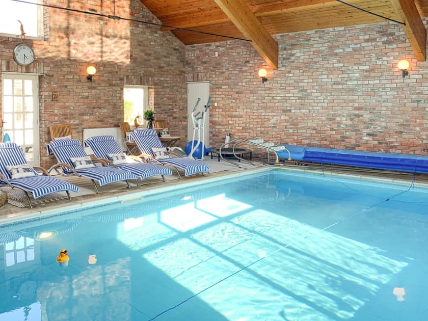 Swimming pool area can be booked at small extra cost | Harlequin House, Holmfirth