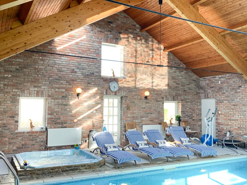 Swimming pool area can be booked at small extra cost | Harlequin House, Holmfirth