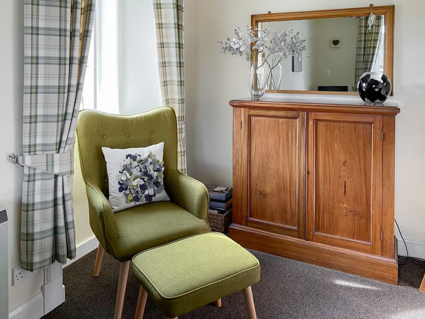 Relax in the “reading corner” where you will find a large selection of books and board games to keep the little or big ones happy | Kirnan Cottage, Kilmichael Glassary, near Lochgilphead