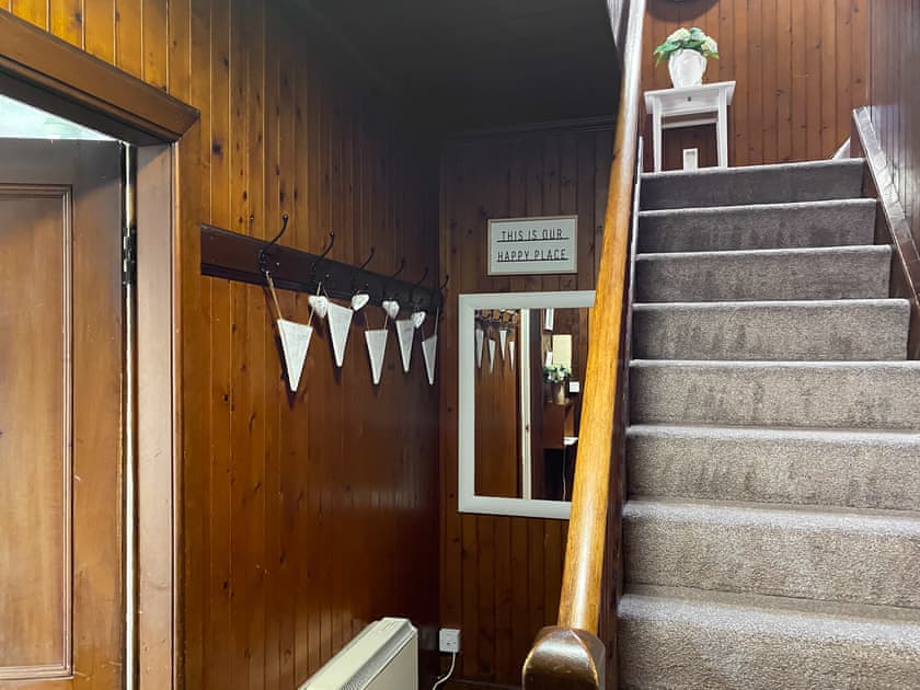 Original wood lined entrance hall leading up to 2 double bedrooms featuring wood lining and velux windows | Kirnan Cottage, Kilmichael Glassary, near Lochgilphead