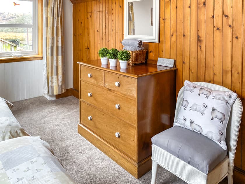 Upstairs bedrooms featuring original cottage furniture giving a mix of old and new | Kirnan Cottage, Kilmichael Glassary, near Lochgilphead