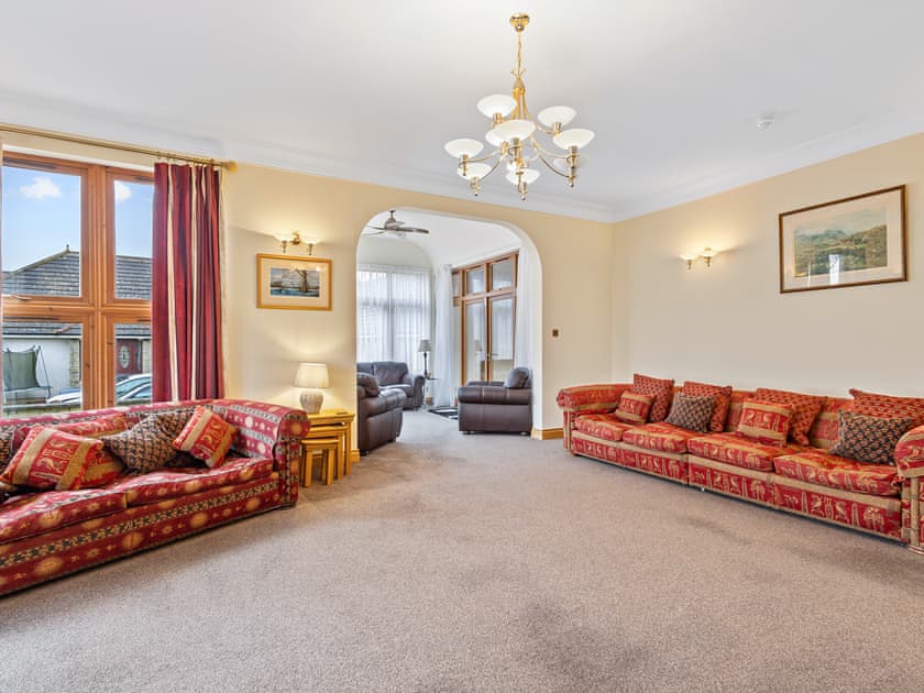 Large living room with open aspect to sunroom | Piperdam House, Piperdam, near Dundee