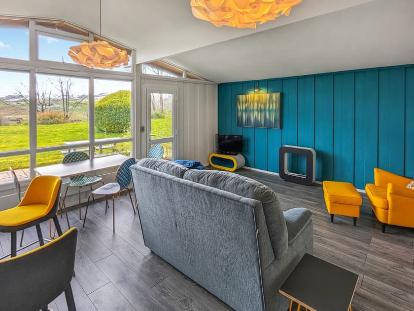 Open plan living space | Ysgubor Lodge, Llanwrin