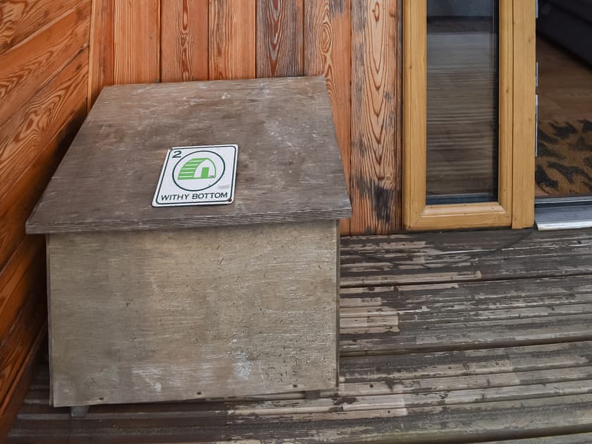 Decked terrace with outdoor furniture | Withy Bottom - Moorside Glamping Pods, Corney, near Millom