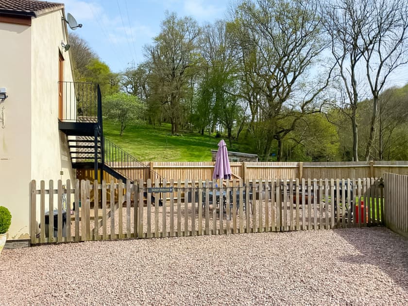 Lovely holiday home with mature garden | Perivale Lodge, near Lydney 