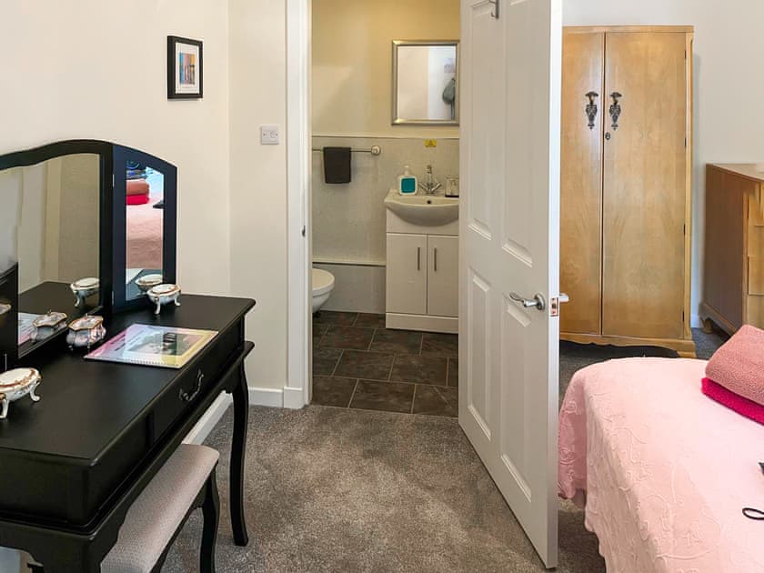 Bedroom 1 with en-suite toilet | Milnhead Cottage, Dumfries