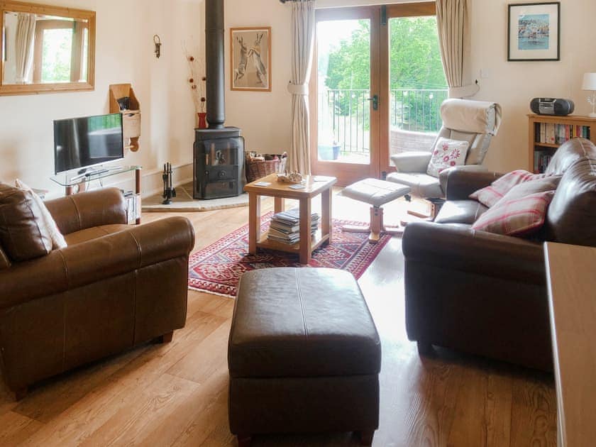 Living room with wood burner | Swallow’s Barn, Ashburnham, Battle