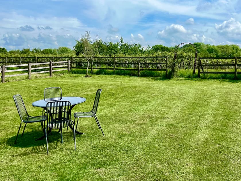 Seating area within the garden | Lovells Barn, Welland, near Malvern