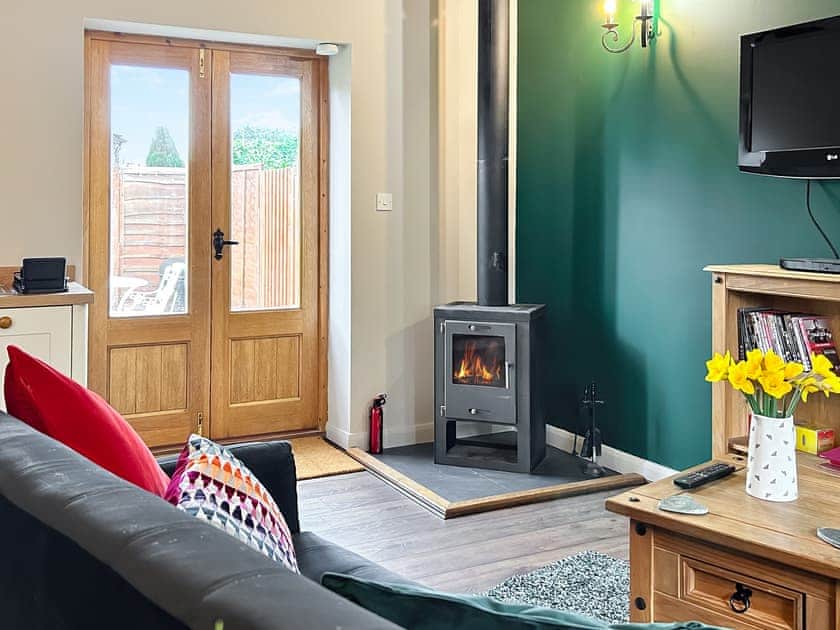 Welcoming living area with wood burner | Nuthatch Barn - Little Derril, Derril, near Bude