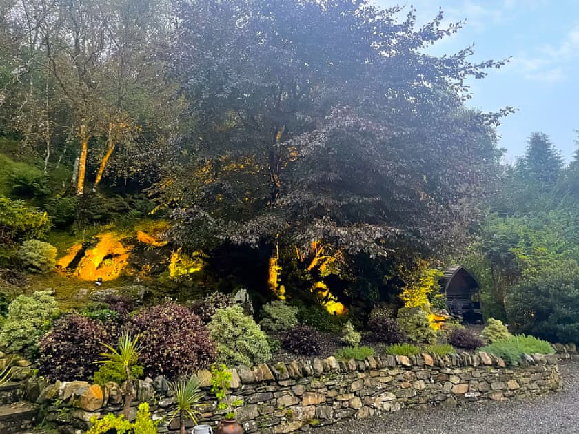The dry stone walled courtyard garden features uplighters for spectacular night views | Tigh-na-Creige, Colintraive